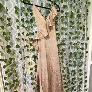 Silky tan dress with ruffles and slit up right side